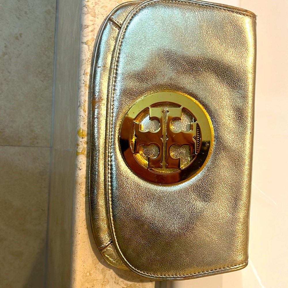 Tory Burch gold clutch